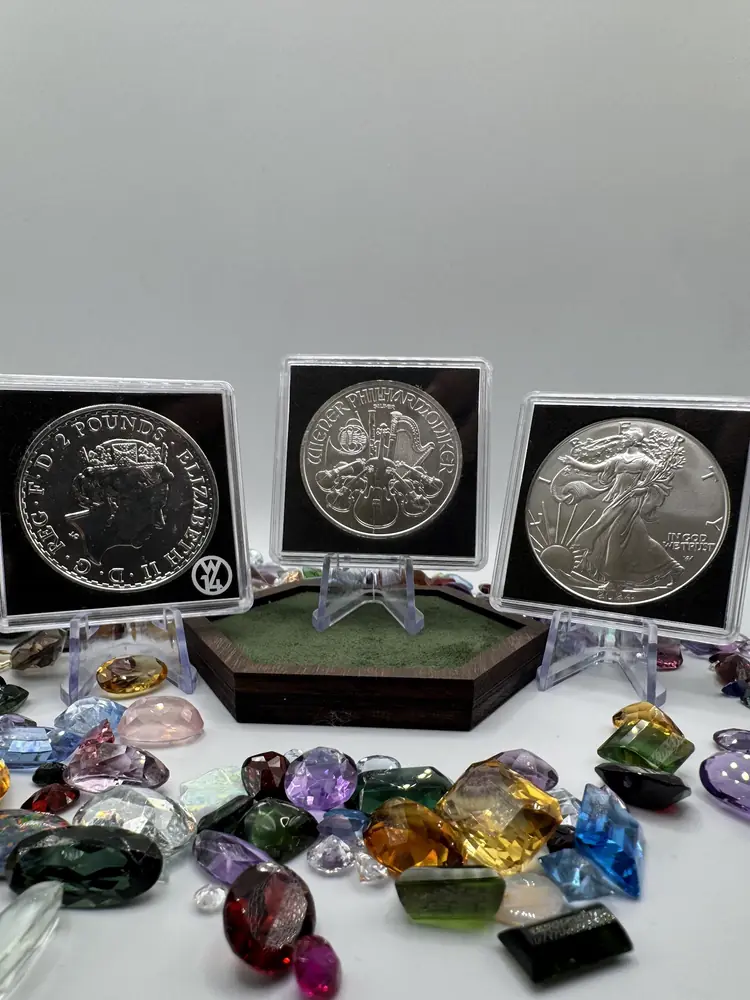 Drei Silberunzen in Kapseln: Britannia, Wiener Philharmoniker und American Silver Eagle